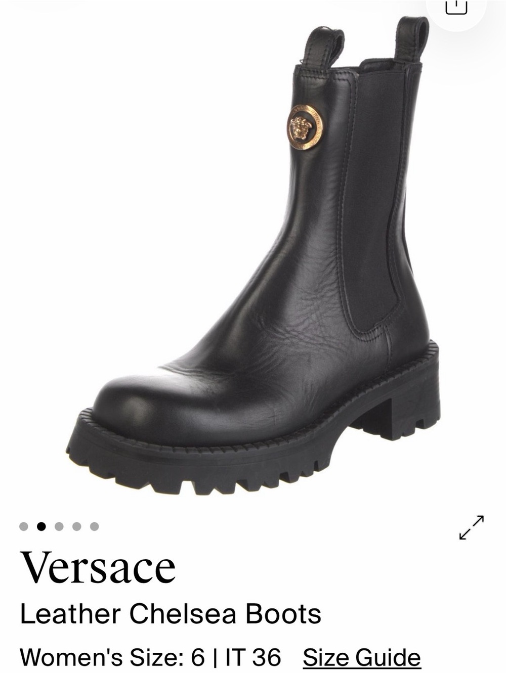 Gucci Black Leather Chelsea Boots with Gold Medallion